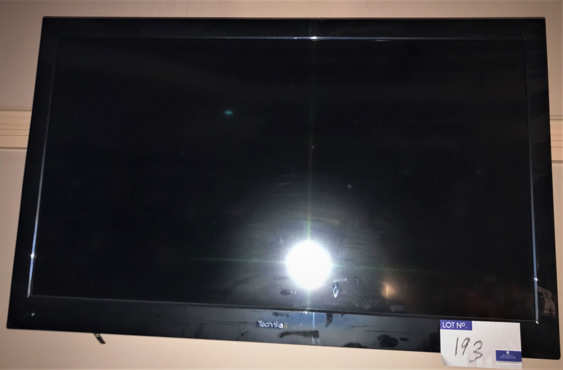 A Technika 40in Television with Wall Bracket.