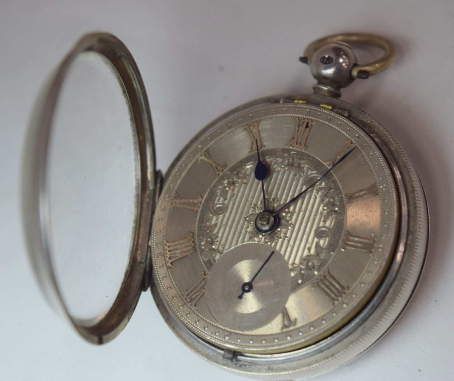 Silver Pocket Watch With Chased Silver Dial