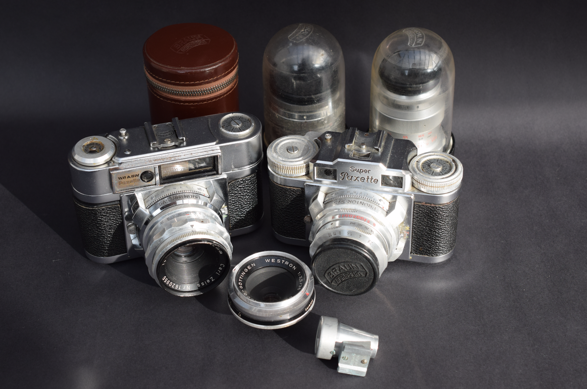 Hard Case Set Of Braun Cameras With Various Lenses