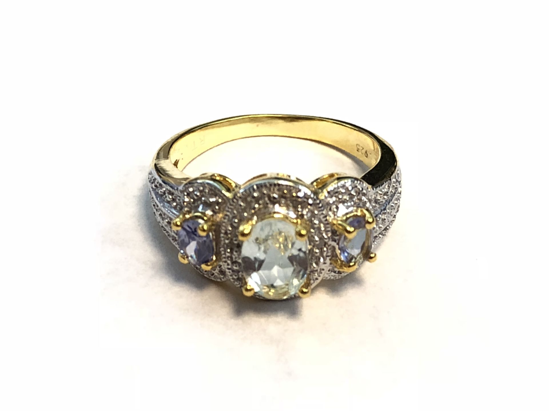 Platinum over sterling silver diamond and mixed stones ring