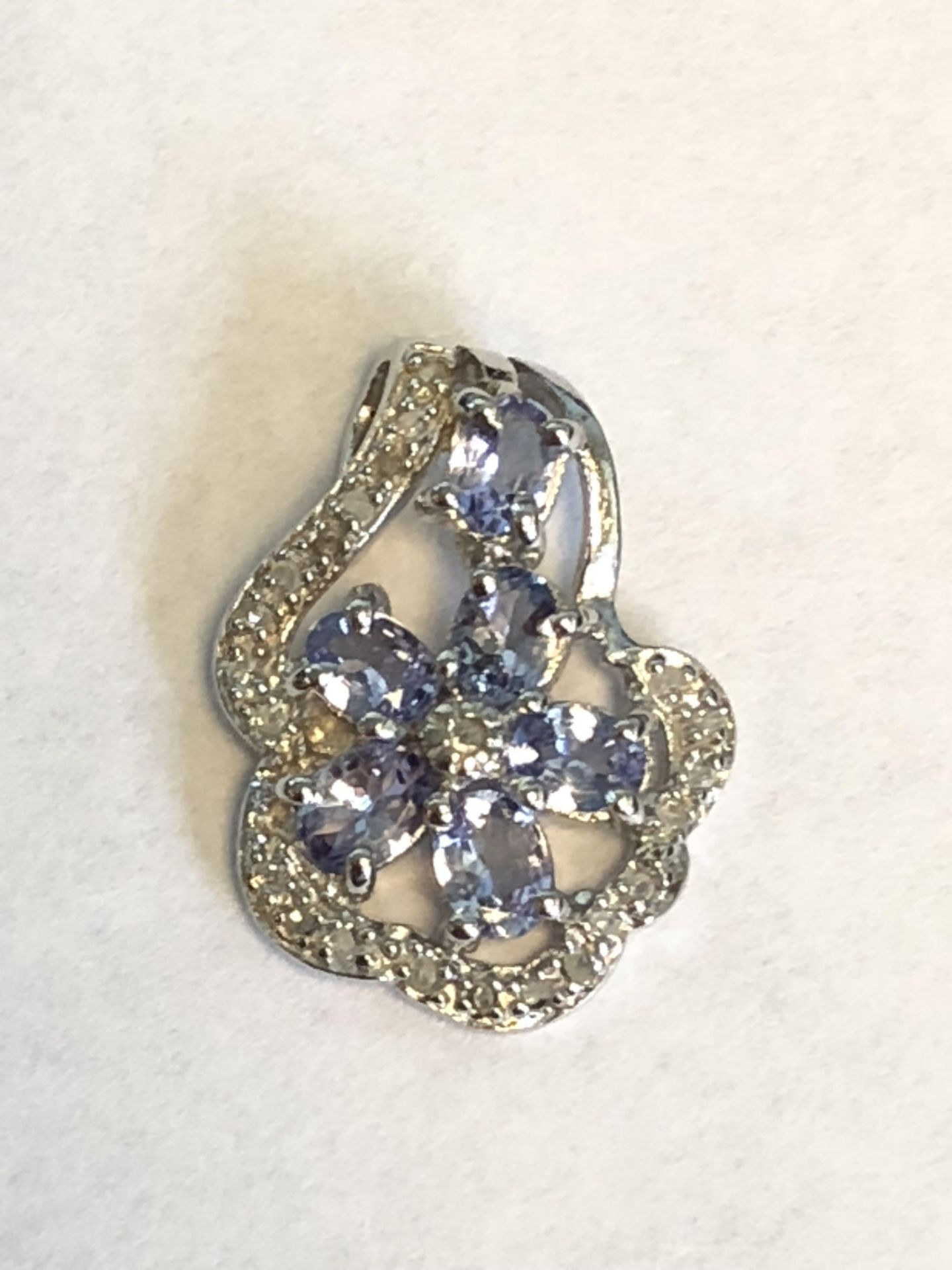 Platinum over sterling silver Tanzanit and Diamond Pendant