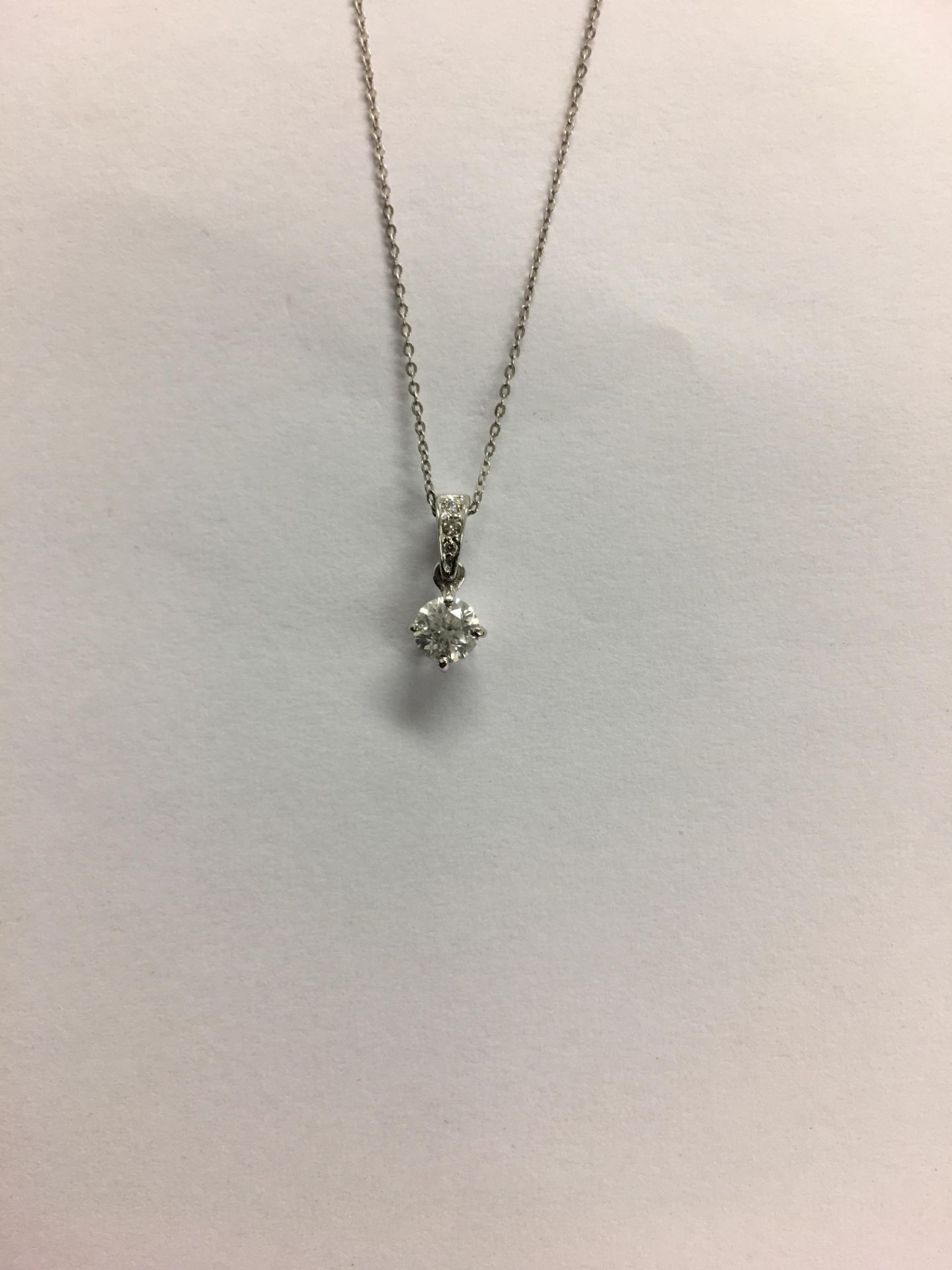 8ct white gold diamond pendant,0.33ct brilliant cut diamond h colour i1 clarity,diamond set mount - Image 2 of 2
