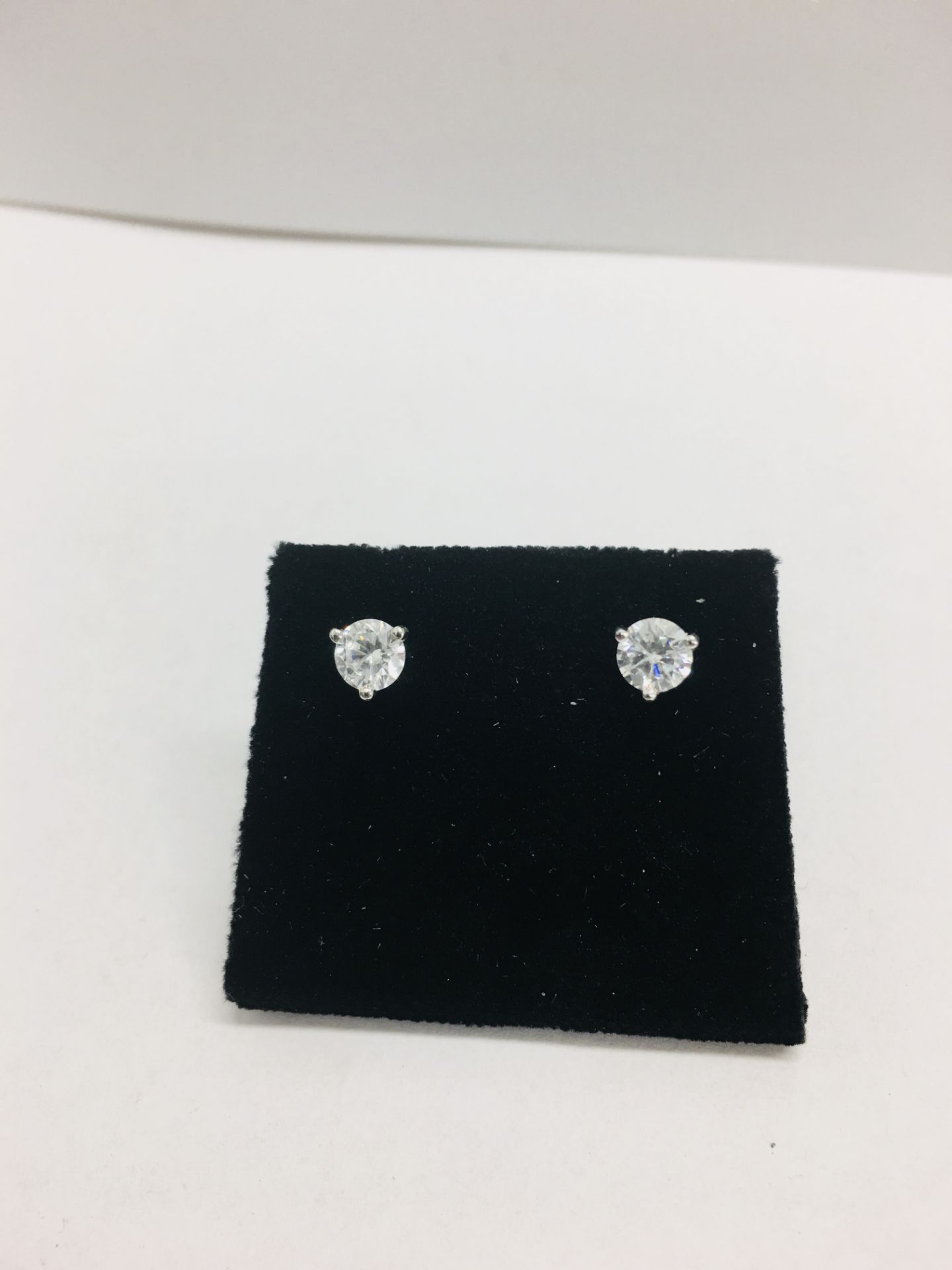 0.70ct diamond solitaire stud earrings set in platinum. I colour, si3 clarity. 3 claw setting with - Image 2 of 5