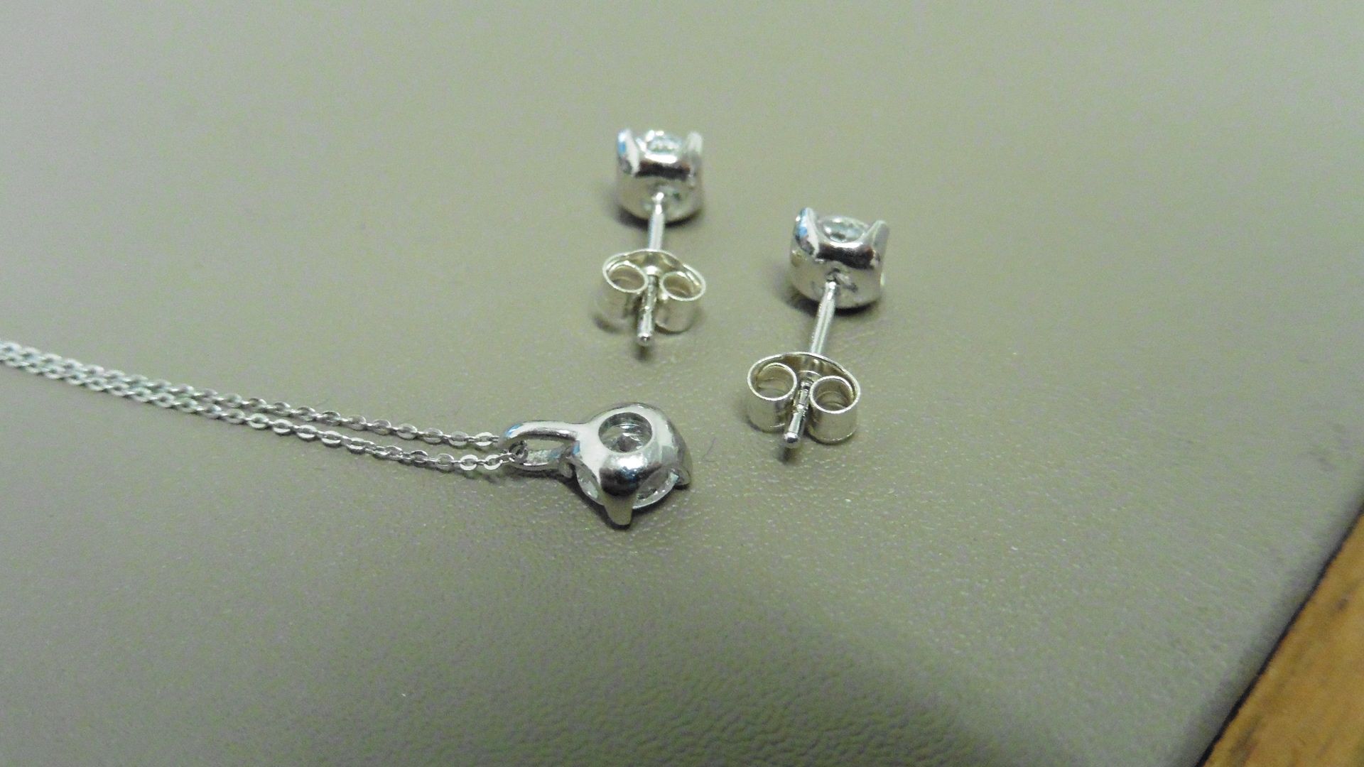 0.25ct / 0.50ct diamond pendant and earring set in platinum. Pendant - 0.25ct brilliant cut diamond, - Image 2 of 2