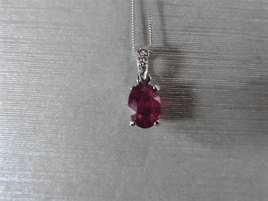 1ct ruby and diamond pendant with an 7x5mm oval cut ruby ( fracture treated ) and a diamond set