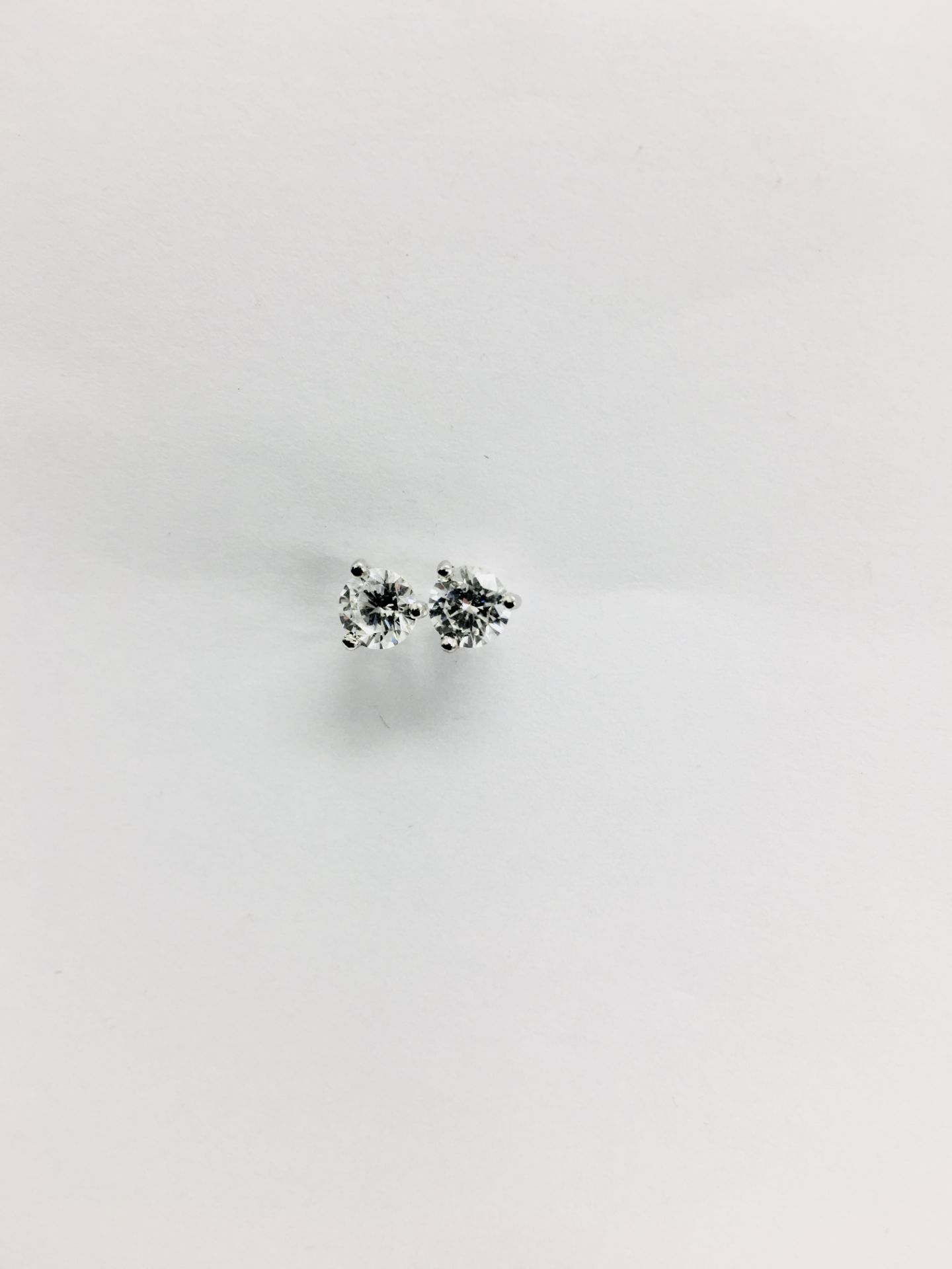 0.70ct diamond solitaire stud earrings set in platinum. I colour, si3 clarity. 3 claw setting with - Image 5 of 5