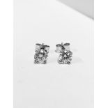 1.00ct Solitaire diamond stud earrings set with enhanced brilliant cut diamonds, SI3 clarity and H