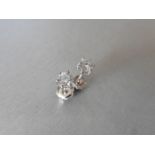 0.50ct Solitaire diamond stud earrings set with brilliant cut diamonds, SI2 clarity and I colour.