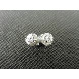 0.25ct diamond set stud earrings in 9ct white gold. Small brilliant cut diamonds. H colour and I1-