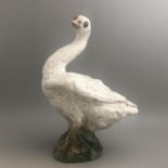 A Bavent, Normandy, French pottery faience Goose with green glass eyes