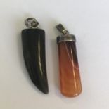 Two vintage natural gemstone pendants with silver metal mounts