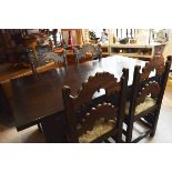 Large Jacobean style Oak Refectory table and chairs.