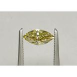 Marquise-shaped diamond weighing app. 0.61ct. Colour : Yellow .Clarity :VS2