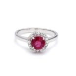 An eloquent and one of a kind Ruby and Diamond ring mounted in 18K White Gold