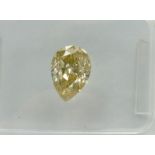 Pear-shaped diamond weighing app. 0.9ct. Colour : Yellow .Clarity :I1(eye-clean)