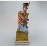 A Royal Copenhagen Porcelain Tinderbox Soldier & Dog Figure early 20th C.