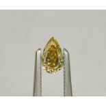 Pear-shaped diamond weighing app. 0.48ct. Colour : Yellow .Clarity :VS2