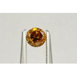 Round-shaped diamond weighing app. 0.47ct. Colour : Orange Yellow .Clarity :SI1