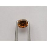 Cushion-shaped diamond weighing app. 0.7ct. Colour : Orange-Brown .Clarity :SI2