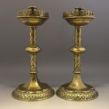 A Pair of 19th Century brass ecclesiastical or gothic style candlesticks