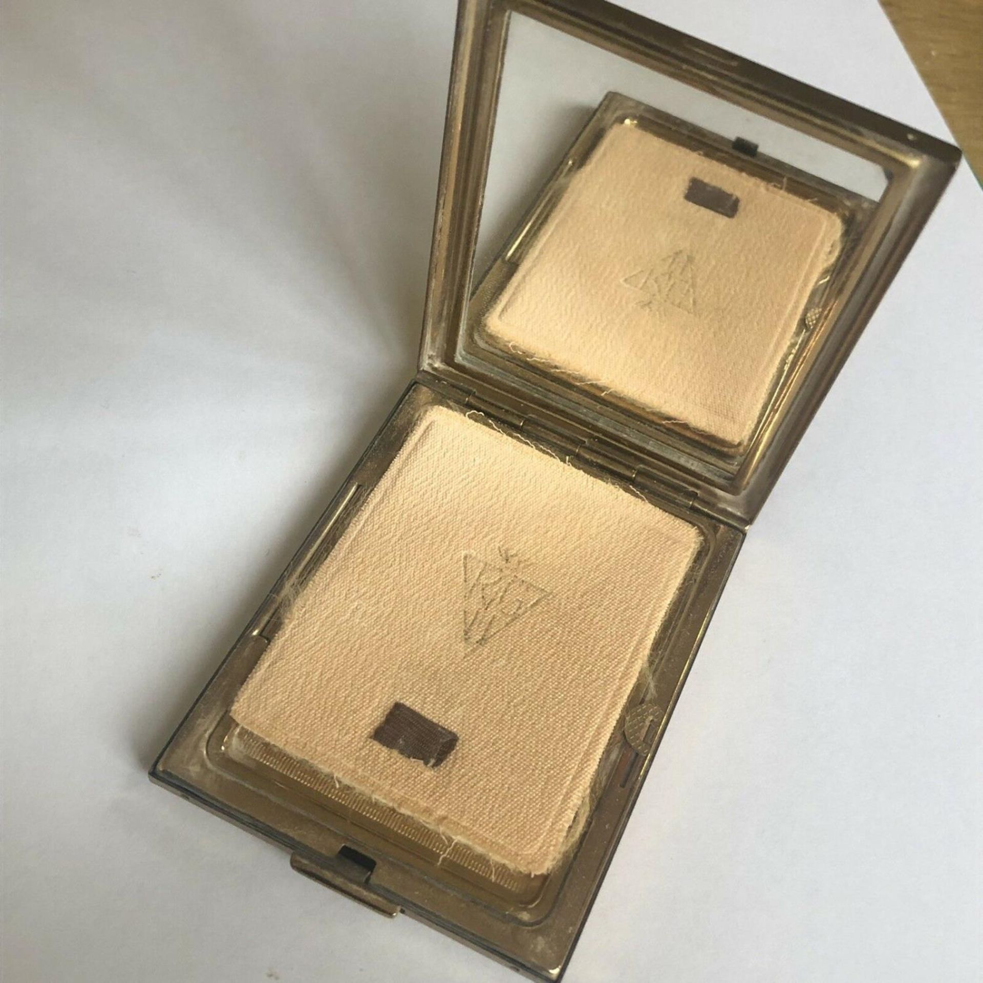 An Art Deco design engine turned gold colour powder rectangular compact by KIGU - Image 3 of 6