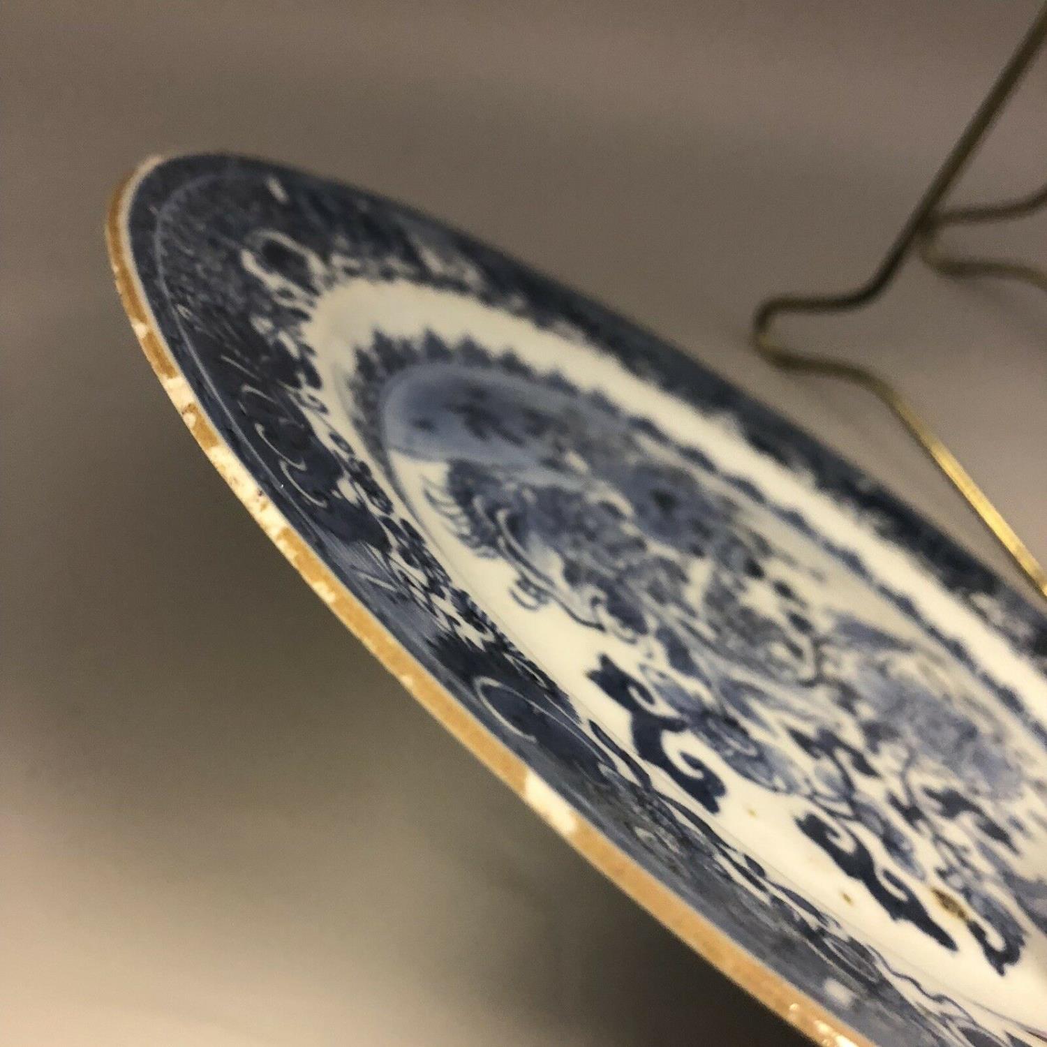 An 18th century Chinese blue and white plate with trees moths & precious objects - Image 7 of 8