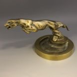 Cast brass ashtray with leaping jaguar mount