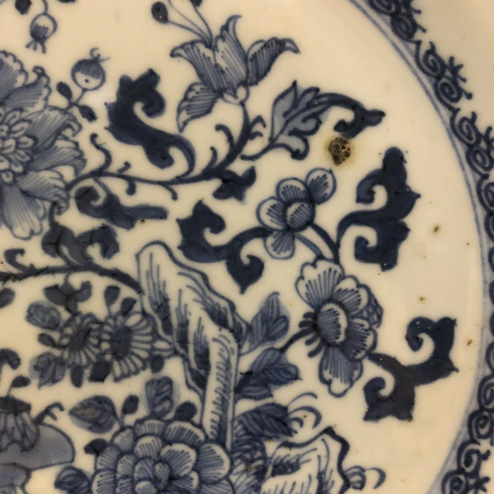 An 18th century Chinese blue and white plate with trees moths & precious objects - Image 4 of 8