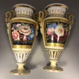 Pair of 19th Century porcelain Empire urn pedestal vases handpainted flowers