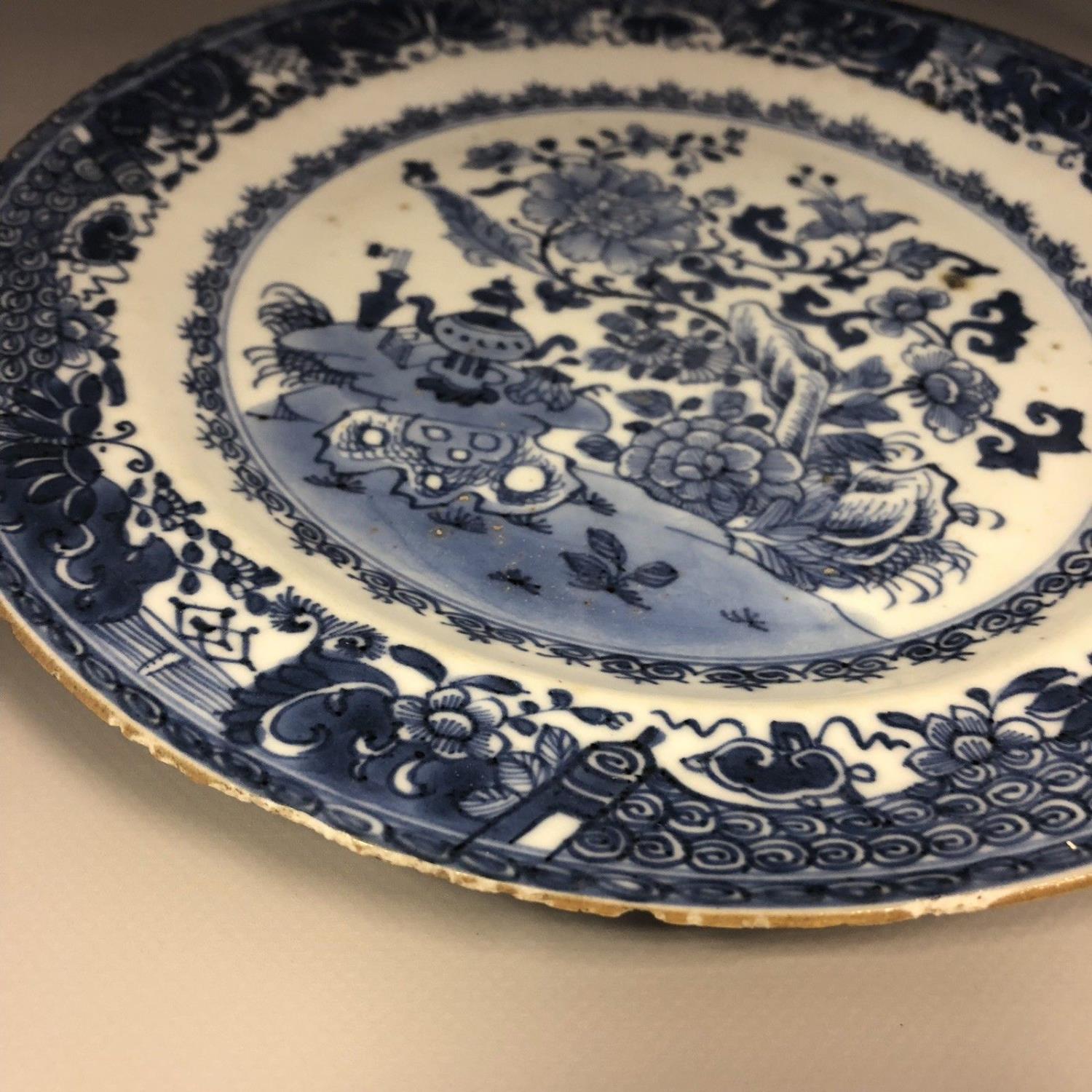 An 18th century Chinese blue and white plate with trees moths & precious objects - Image 5 of 8