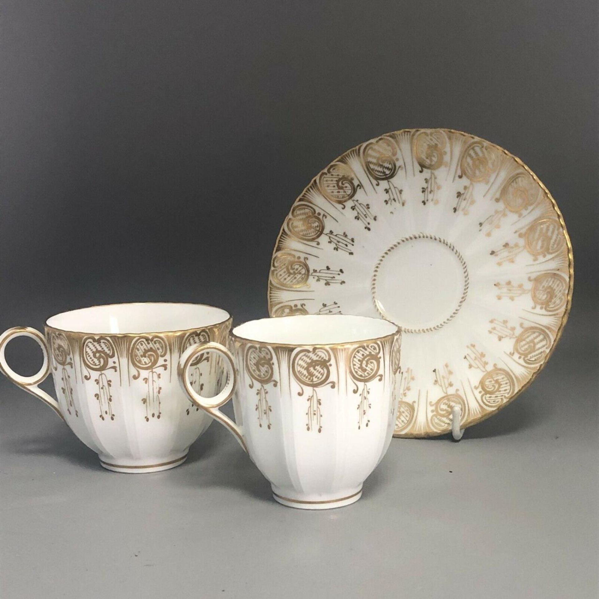 c1880, A Davenport Porcelain Group - Coffee Can, Tea Cup & Saucer