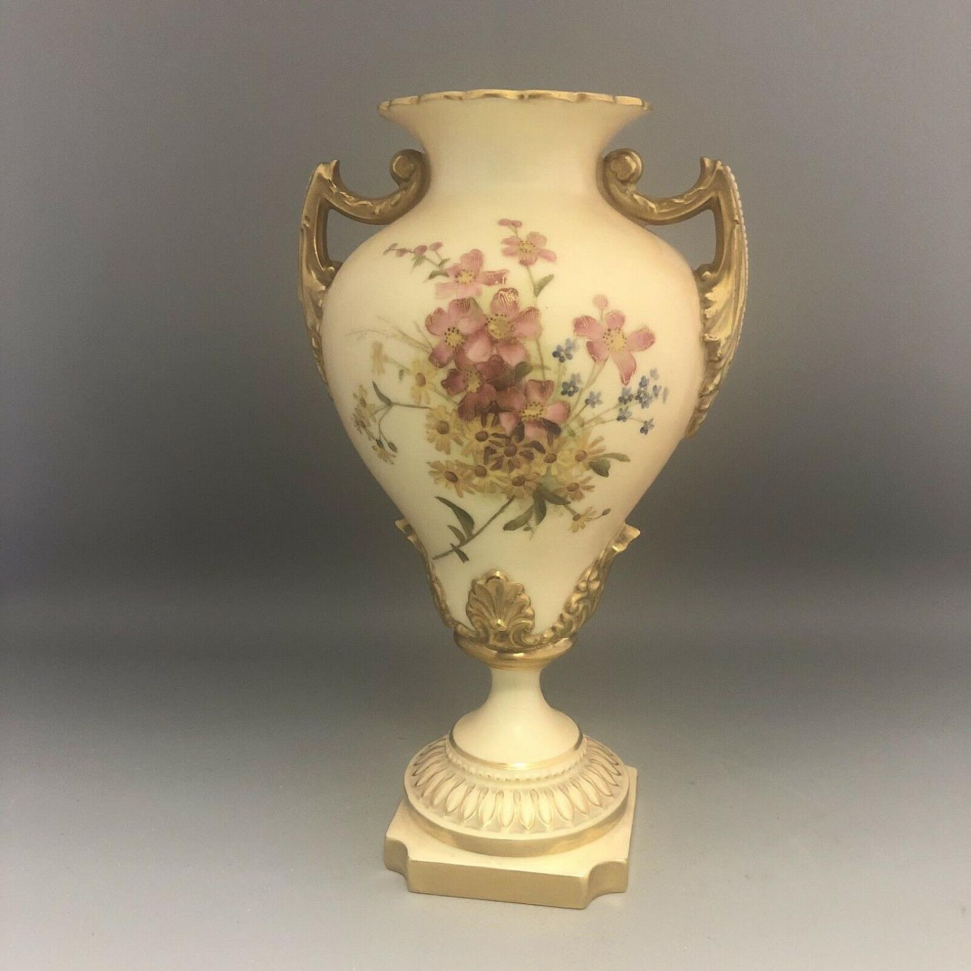 c1903, A Royal Worcester Blush Ivory Porcelain Hand Painted Flowers Pedestal Urn Vase