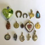 A group of vintage costume jewellery pendants - (15) - No reserve