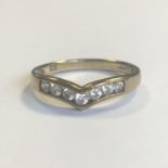 A Vintage 9ct yellow gold wishbone ring set with clear stones - Size O