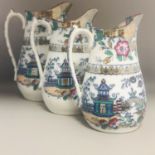 A Set of three 19th Century Graduated Chinoiserie Pottery Dresser Jugs