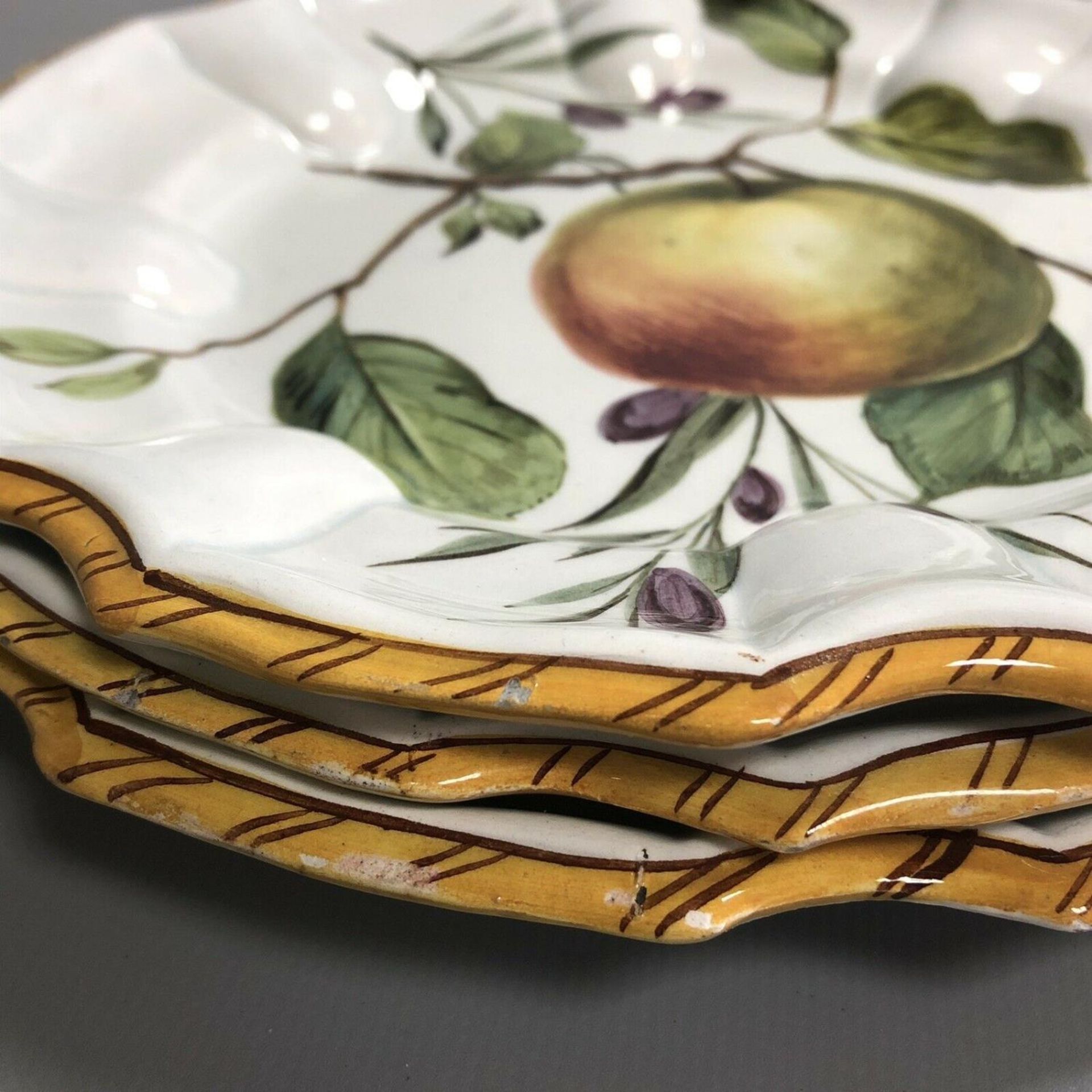 A set of three antique Continental pottery plates hand painted with fruits - Image 8 of 8