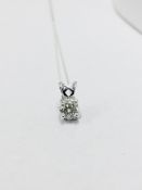 1.00ct diamond pendant set in platinum. H colour and I1 clarity. 4 claw setting with open bale and