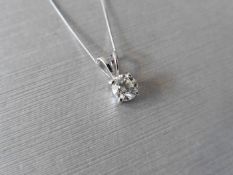 0.50ct diamond solitaire pendant set in a platinum 4 claw setting. I colour and VS clarity (