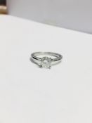 1.03ct diamond solitaire ring set in platinum. Brilliant cut diamond, H colour and I1-2 clarity. 6