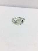 1.05ct Radiant cut Natural Diamond H colour I clarity,two 0.25ct round brilliant cut h colour si2