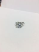 PLatinum Diamond Halo style ring,0.50ct h colour si grade round brilliant cut natural diamond,20