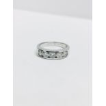 1.25ct diamond band ring. 5 brilliant cut diamonds, I colour and si3 clarity. Channel setting set in