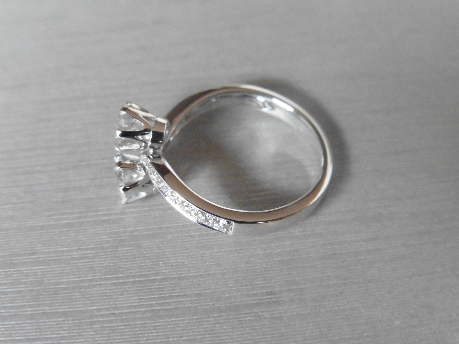 1.00ct diamond 2 stone twist ring. 2 brilliant cut diamonds 0.50ct each , G/H colour and VS - Image 3 of 4