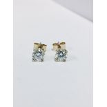 1.00ct diamond solitaire earrings set in 18ct yellow gold. 2 x brilliant cut diamonds, 0.50ct (