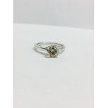 1.00ct diamond solitaire ring set in platinum. IKcolour and I1 clarity. 4 claw setting, size M.