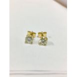 1.50ct diamond earrings,two 0.75ct diamods brilliant cut si grade i colour ,(clarity enhanced),