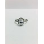 1.04ct Oval Diamond,h colour si2 clarity,18ct white gold diamond halo setting,0.33ct brilliant cut