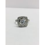 18ct white Gold Halo style diamond ring,0.70ct centre i colour vs clarity,0.25ct si h colour