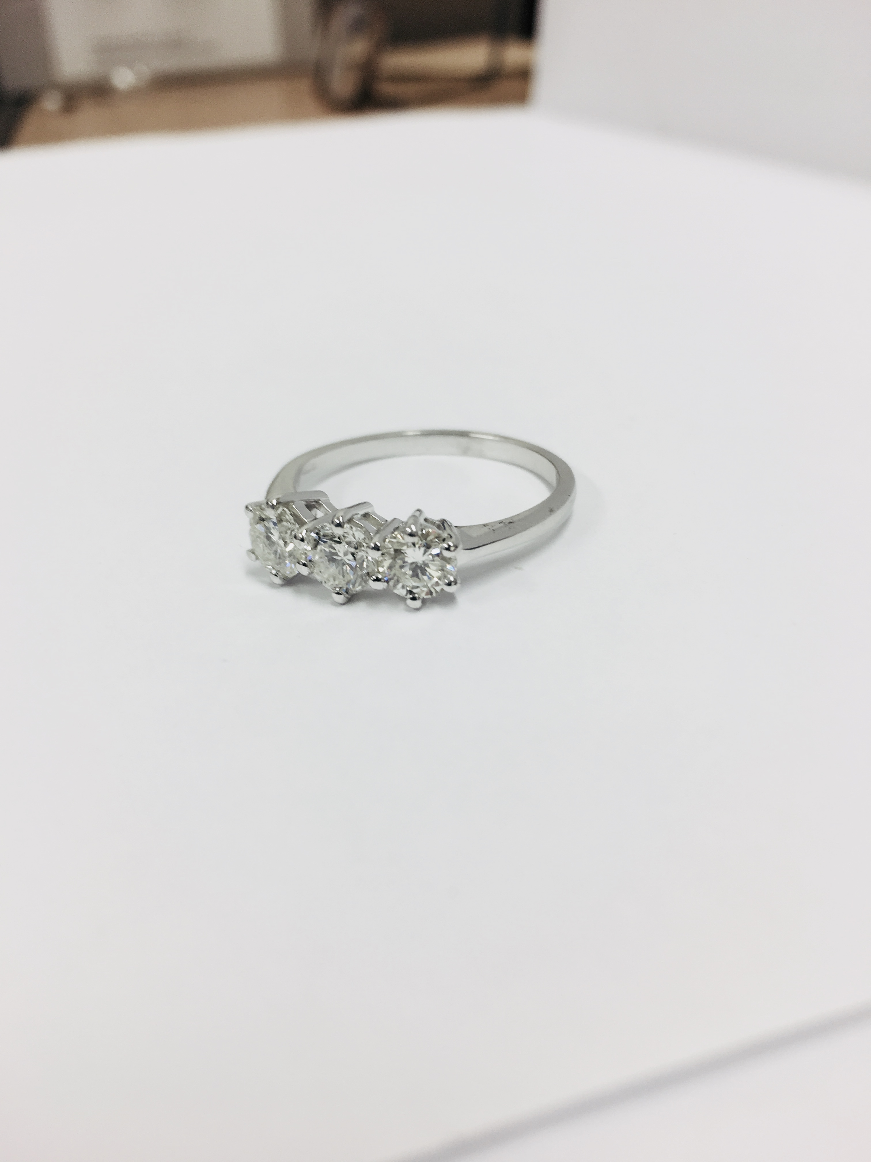 1.55ct diamond trilogy ring. 3 brilliant cut diamonds I colour, si1 clarity. Set in 18ct white - Image 2 of 7