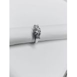 18ct white gold 1.30ct three stone diamond ring,0.70ct centre iamond h i1 clarit,2x0.30ct(0.60ct